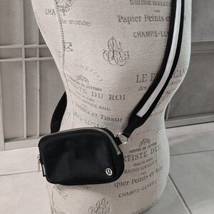 lululemon athletica Black Crossbody Belt Bag with White-Trim Strap
